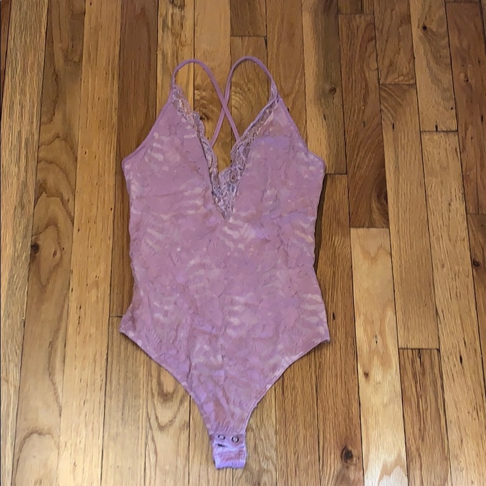 Pink lace body suit
